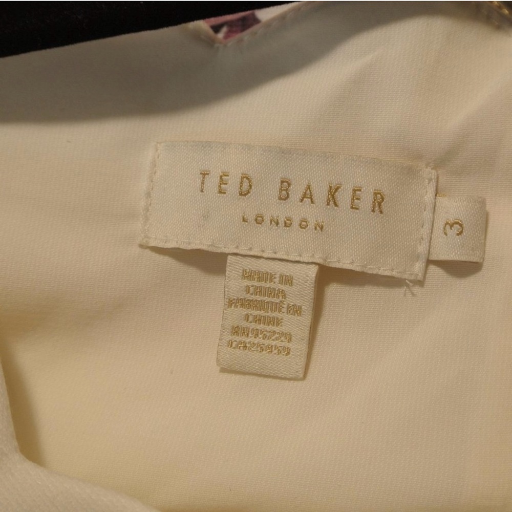 Ted Baker Strapless Dress with Pastel Floral Pattern
Seize 3 US 8 - Picture 9 of 10